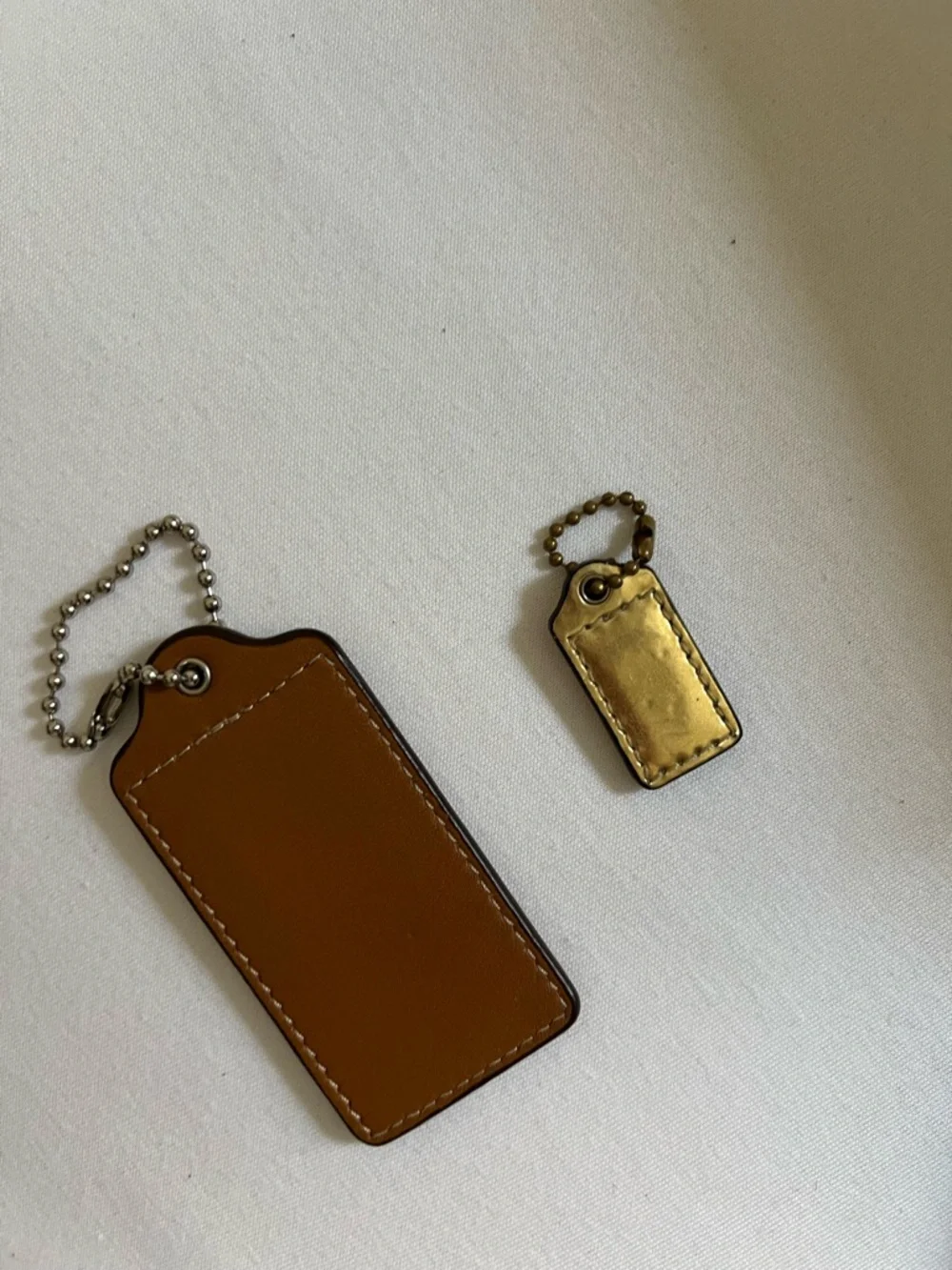 Coach Brown Leather Key Tag with Gold-Tone Charm